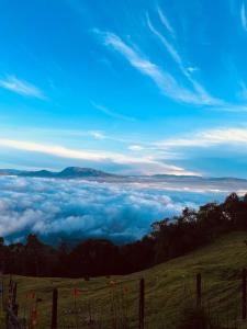 a view of a field of clouds in the sky at En las Nubes in Medellín