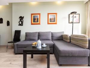 A seating area at Apartment Sants-Montjuic Rambla Badal by Interhome