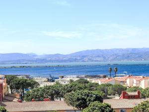 a view of the ocean from a city at Apartment Soleil Levant 1 et 2-2 by Interhome in Le Barcarès