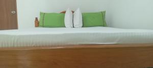 Rúm í herbergi á Forest Villa Nature Resort