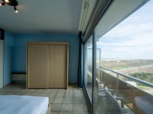 Postel nebo postele na pokoji v ubytování Apartment Ref- 801 by Interhome