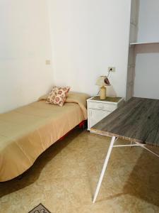 Posteľ alebo postele v izbe v ubytovaní Casa vacanza Giusi