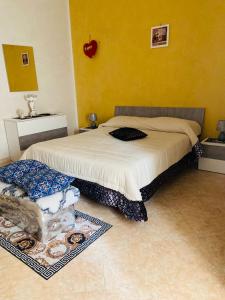 Posteľ alebo postele v izbe v ubytovaní Casa vacanza Giusi