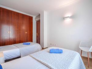 Posteľ alebo postele v izbe v ubytovaní Apartment Maritimo by Interhome