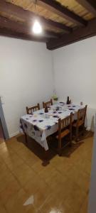 a room with a table and chairs in a room with a table and chairsktop at Rincon de Valdaliga in Valdaliga  +12 photos