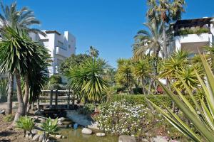 A garden outside 1126 BEACHFRONT HIGH STANDARD APARTMENT WITH TERRACE