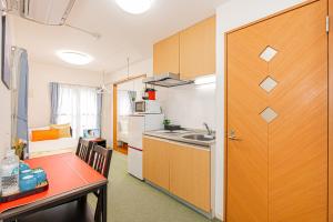Een keuken of kitchenette bij close KYARA HOTEL 亀戸201