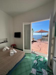 Postel nebo postele na pokoji v ubytování Casa Positano