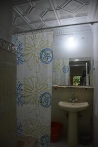 Koupelna v ubytování White Palace Hotel, Swat