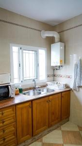 Η κουζίνα ή μικρή κουζίνα στο Casa Becquer 3 - Solo familias +12 φωτογραφίες