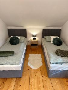 Posteľ alebo postele v izbe v ubytovaní Villa na Dolnej + 21 fotografií