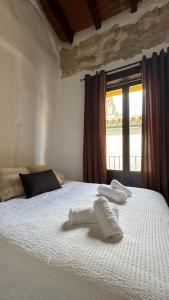 Cama o camas de una habitación en Apartamentos Jerez Siglo XIX