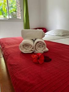 Een bed of bedden in een kamer bij Villa Karo Coco