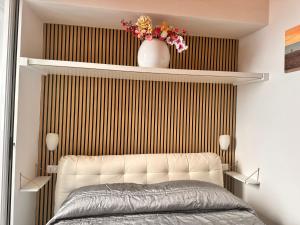 Łóżko lub łóżka w pokoju w obiekcie Hostel Brikette