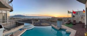 a view of a pool on a cruise ship at Oceansnest Guest House in Bloubergstrand