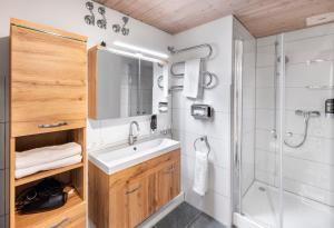 Ванная комната в Hotel Sonnenstube Hagnau