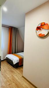 Voodi või voodid majutusasutuse Hotel Libers toas