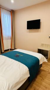 Voodi või voodid majutusasutuse Hotel Libers toas