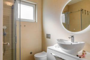 Kúpeľňa v ubytovaní Apartments Mialis