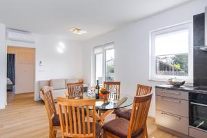 Kuchyňa alebo kuchynka v ubytovaní Apartments Mialis