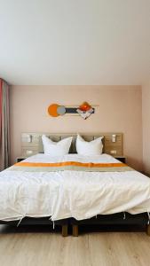 Voodi või voodid majutusasutuse Hotel Libers toas
