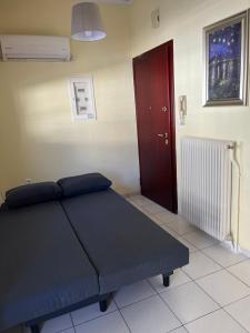 Postel nebo postele na pokoji v ubytování Qqueen House