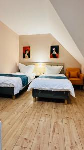 Voodi või voodid majutusasutuse Hotel Libers toas