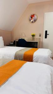 Voodi või voodid majutusasutuse Hotel Libers toas