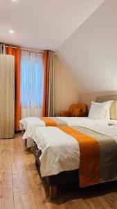 Voodi või voodid majutusasutuse Hotel Libers toas