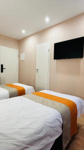 Voodi või voodid majutusasutuse Hotel Libers toas