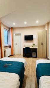 Voodi või voodid majutusasutuse Hotel Libers toas