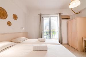 Postel nebo postele na pokoji v ubytování Irene Apartments