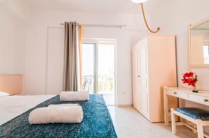 Postel nebo postele na pokoji v ubytování Irene Apartments