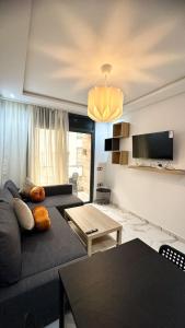 Televisyen dan/atau pusat hiburan di Appartement BMK N-1
