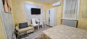 Postel nebo postele na pokoji v ubytování B&B Le Palme