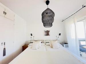 Posteľ alebo postele v izbe v ubytovaní Charming & cosy beach apartment