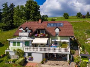 an aerial view of a house with a balcony at Privatzimmer Haus Gschweitl in Semriach