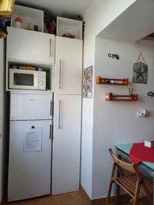 Kuchyňa alebo kuchynka v ubytovaní B&b Adele