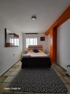 Postel nebo postele na pokoji v ubytování Habitacion muy céntrica.
