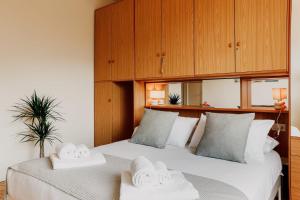 Ένα ή περισσότερα κρεβάτια σε δωμάτιο στο Appartamento 39 Moltrasio, Como Lake