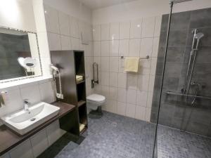 Koupelna v ubytování Hotel Vollmann
