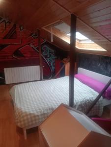 a room with two bunk beds and a mural at Valarya in Cercedilla +12 photos