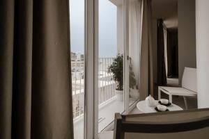 Balkón nebo terasa v ubytování Calammare Apartments - Luxury Apartments with Beach and Gym - Molfetta