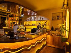 Lounge nebo bar v ubytování Hotel Golden Orchid
