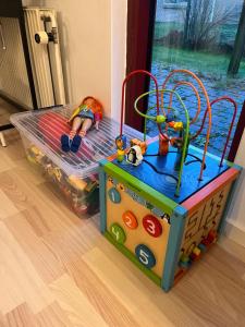 a childs bed with a toy on it at Apartment in Billund in Billund +4 photos