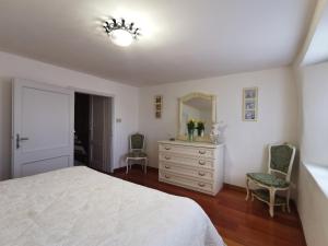 Postel nebo postele na pokoji v ubytování La casa nel borgo