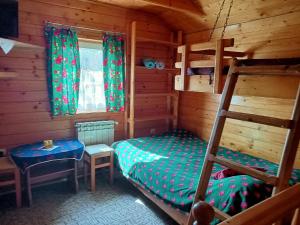 Posteľ alebo postele v izbe v ubytovaní Mały domek pod lasem