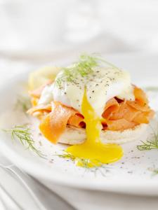 a breakfast sandwich with an egg on a plate at Mondrian Park Avenue in New York