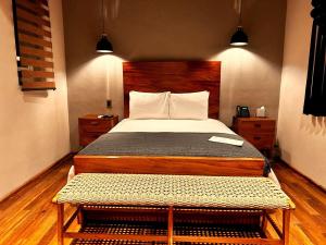 Postel nebo postele na pokoji v ubytování Bito's Hotel Boutique