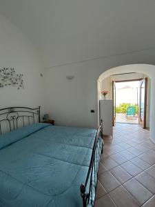 Ένα ή περισσότερα κρεβάτια σε δωμάτιο στο Casa Barone